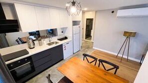 Superior Apartment, 1 Bedroom | Private kitchen | Full-size fridge, oven, stovetop, dishwasher