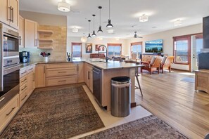 Fridge, microwave, oven, stovetop - Experience luxury slopeside living in this stunning 6BR, 4.5BA Soaring Eagle condo (Snowshoe)