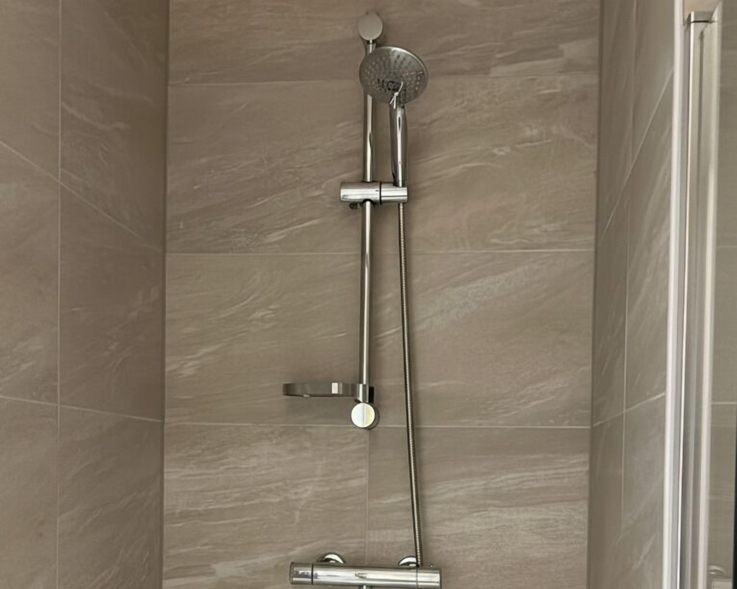 Shower, free toiletries, towels, soap