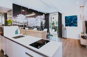 Suite – exclusive, hageutsikt | Eget kjøkken