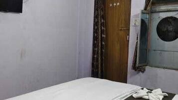 Habitación Deluxe | Camas extra, wifi gratis y ropa de cama