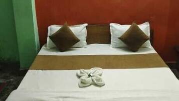 Habitación Deluxe | Camas extra, wifi gratis y ropa de cama