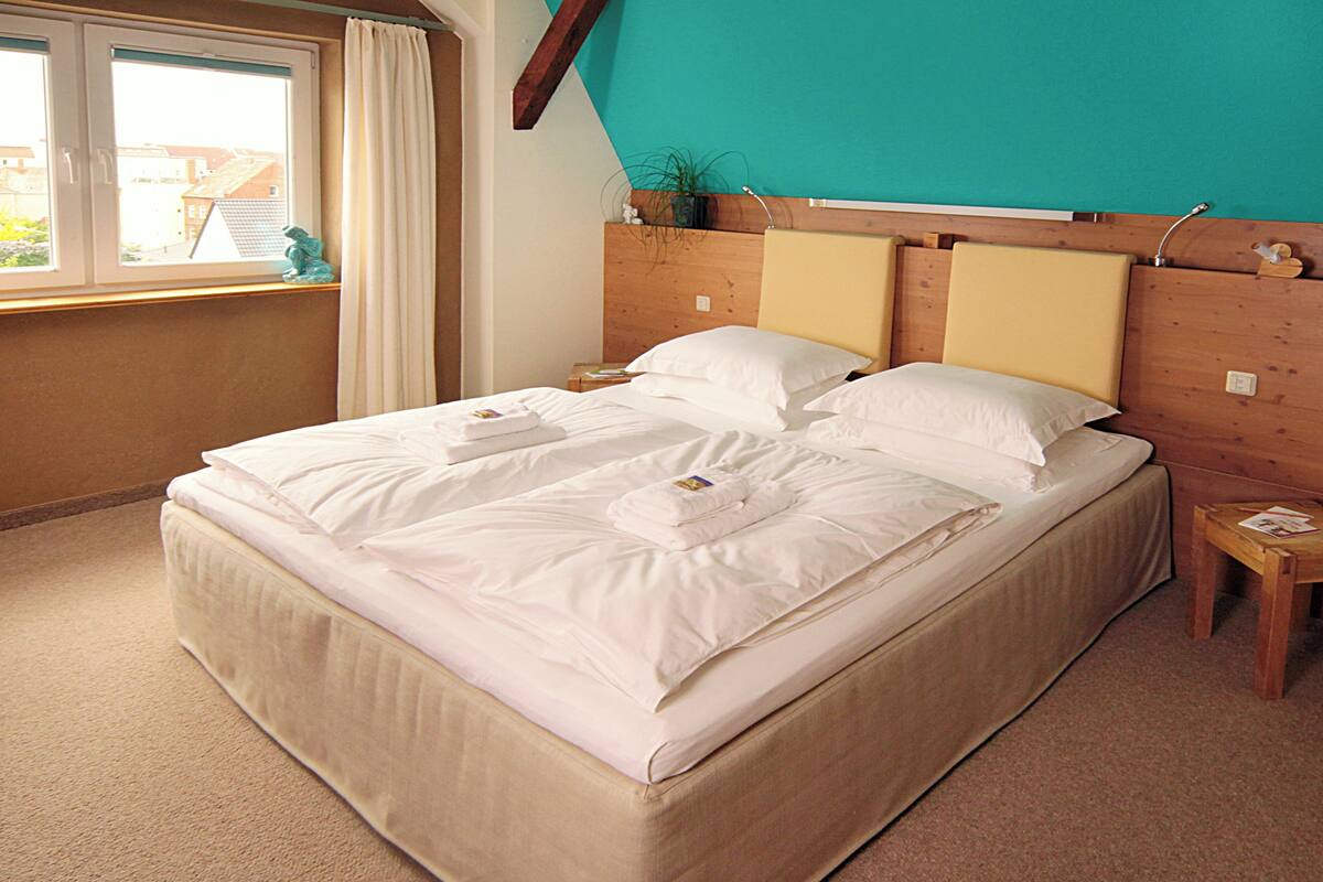 Standard Suite, Balcony, Courtyard View | In-room safe, blackout curtains, free WiFi