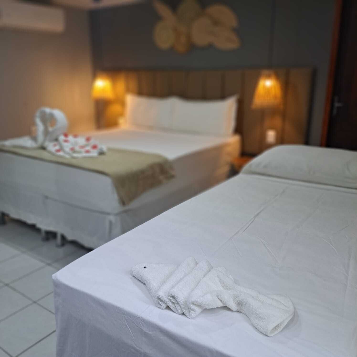 Kolmen hengen exclusive-huone | Tallelokero huoneessa, ilmainen Wi-Fi, vuodevaatteet