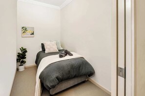 2 bedrooms, travel crib, WiFi, bed sheets