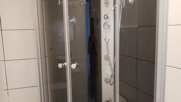 Shower, free toiletries, hair dryer, towels