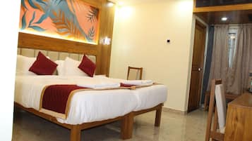 Habitación Deluxe con 1 cama doble o 2 individuales | Escritorio, camas supletorias, wifi gratis y ropa de cama