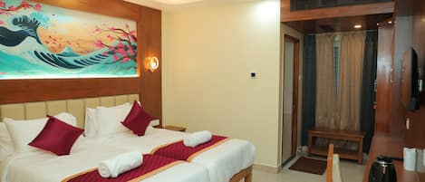 Habitación Deluxe con 1 cama matrimonial o 2 individuales | Escritorio, insonorización, camas extra y wifi gratis