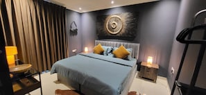 Luxury Quadruple Room, 1 Bedroom, Air conditioning, Garden Area | In-room safe, laptop workspace, blackout drapes, soundproofing - Maison Miraj (Muscat)