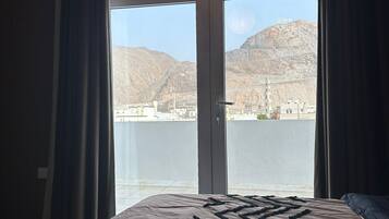 In-room safe, laptop workspace, blackout drapes, soundproofing