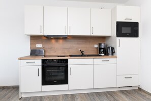 Private kitchen - Moderne Ferienwohnung in Ruhiger Lage, Bensersiel (Esens)