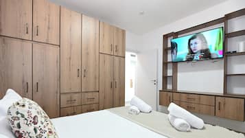 Premium bedding, blackout drapes, iron/ironing board, free WiFi