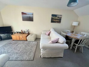House, 2 Bedrooms, Balcony | Living area | Flat-screen TV, books - Entire Two Bedroom Detached Coach House (Exeter)