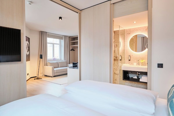 Family Suite | In-room safe, desk, laptop workspace, blackout drapes