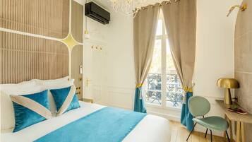 Appartement, uitzicht op de stad | Hypoallergeen beddengoed, pillowtop-bedden, een kluis op de kamer