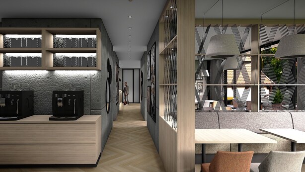 Un intérieur d’hôtel moderne avec un comptoir d’accueil, un espace salon et un mur orné de motifs décoratifs.