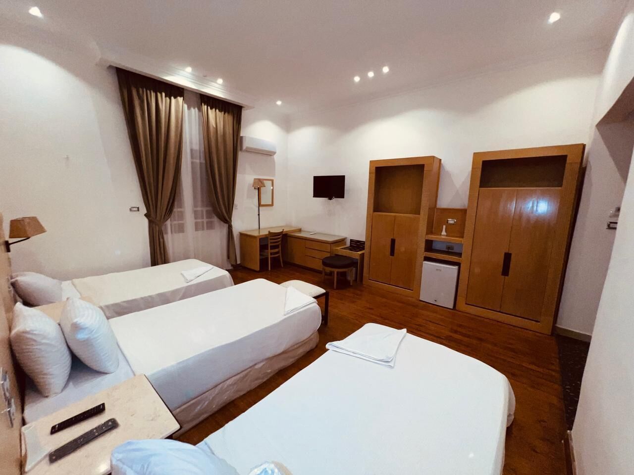 Standard Triple Room, City View | Desk, laptop workspace, free WiFi