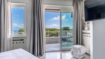 Penthouse, Sea View | In-room safe, laptop workspace, blackout curtains, iron/ironing board