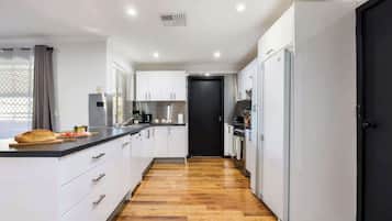 Coffee/tea maker, fridge, microwave, oven