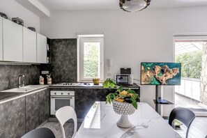 Apartment, Private Pool | Private kitchen | Full-size fridge, microwave, oven, stovetop