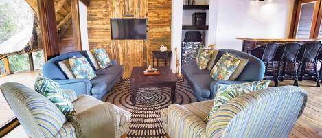 Standard Chalet, 4 Bedrooms | Living area | 64-inch LCD TV with cable channels