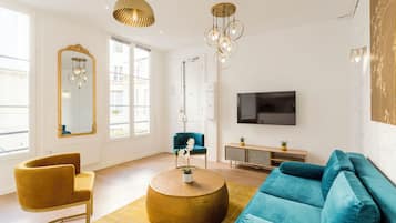 Apartment, Courtyard View | Living area | 33-inch Smart TV with cable channels, Netflix, streaming services