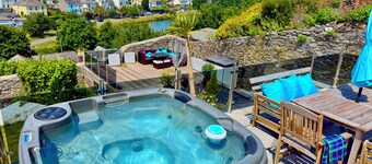 Quirky cottage.  Sleeps 8.  Dog friendly.  Lake views.  Close to the coast.