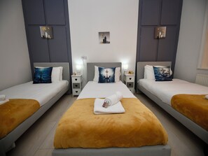 2 habitaciones, tabla de planchar con plancha, wifi y ropa de cama