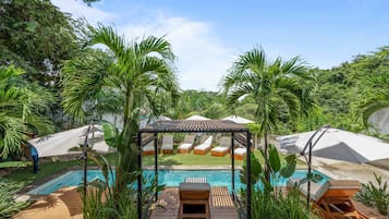 Outdoor pool, pool umbrellas, sun loungers