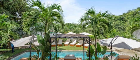 Outdoor pool, pool umbrellas, pool loungers