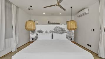 Deluxe Studio, 1 King Bed, Balcony, Pool View | In-room safe, blackout drapes, iron/ironing board, free WiFi