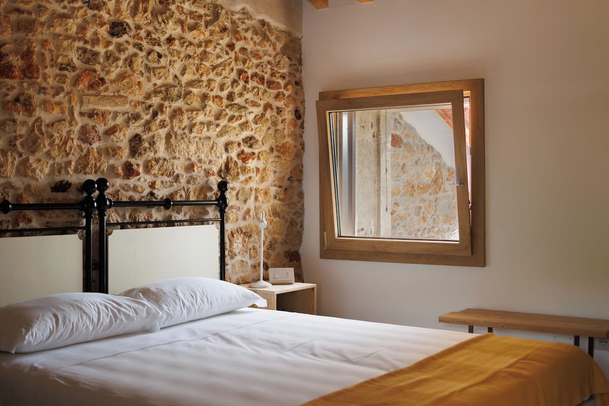 Habitación individual Deluxe, vista al jardín | Ropa de cama