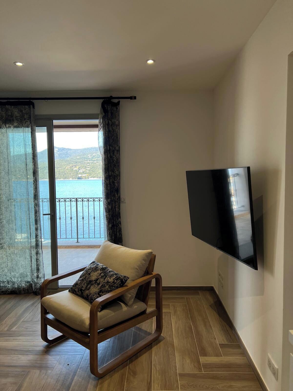 Apartment, Balcony, Sea View | Living area | TV