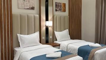 Suite Deluxe | Una cassaforte in camera, tende oscuranti, insonorizzazione