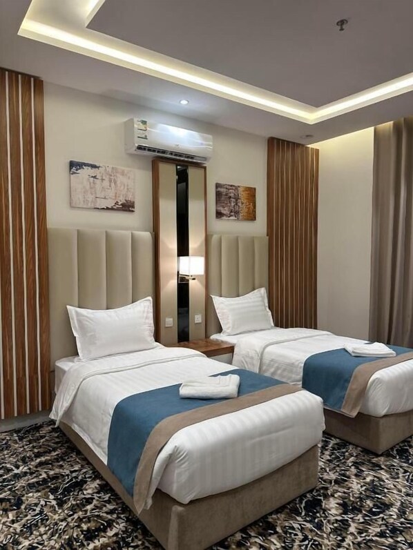 Suite Deluxe | Una cassaforte in camera, tende oscuranti, insonorizzazione