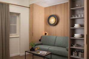 Appartamento Deluxe, 1 letto king con divano letto, non fumatori, cucina | Area soggiorno | Smart TV