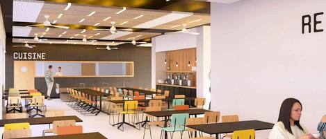 A modern cafe with multiple tables and chairs, a counter labeled 'CUISINE,' and ceiling fans.