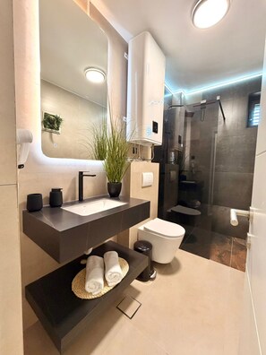 Leilighet – comfort | Bad | Dusj, håndklær, såpe og sjampo