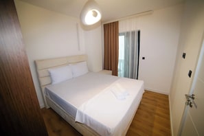 Apartamento básico | Escrivaninha, espaço de trabalho para notebook, Wi-Fi de cortesia