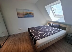 1 habitación, tabla de planchar con plancha, wifi gratis y ropa de cama 