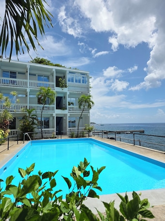 Pool. 2 twin beds or king bed oceanfront hotel room with outdoor pool