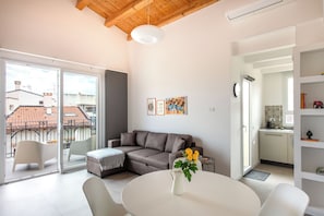 Apartment, 1 Bedroom, Balcony | Living area | 30-inch TV with satellite channels - Suite Vucciria with Terrace by Wonderful Italy (Palermo)