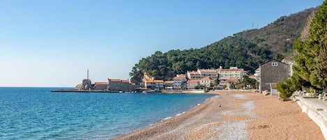 On the beach, white sand