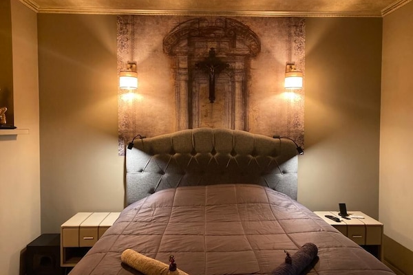 Deluxe Double Room, Courtyard View | Desk, laptop workspace, blackout curtains, iron/ironing board