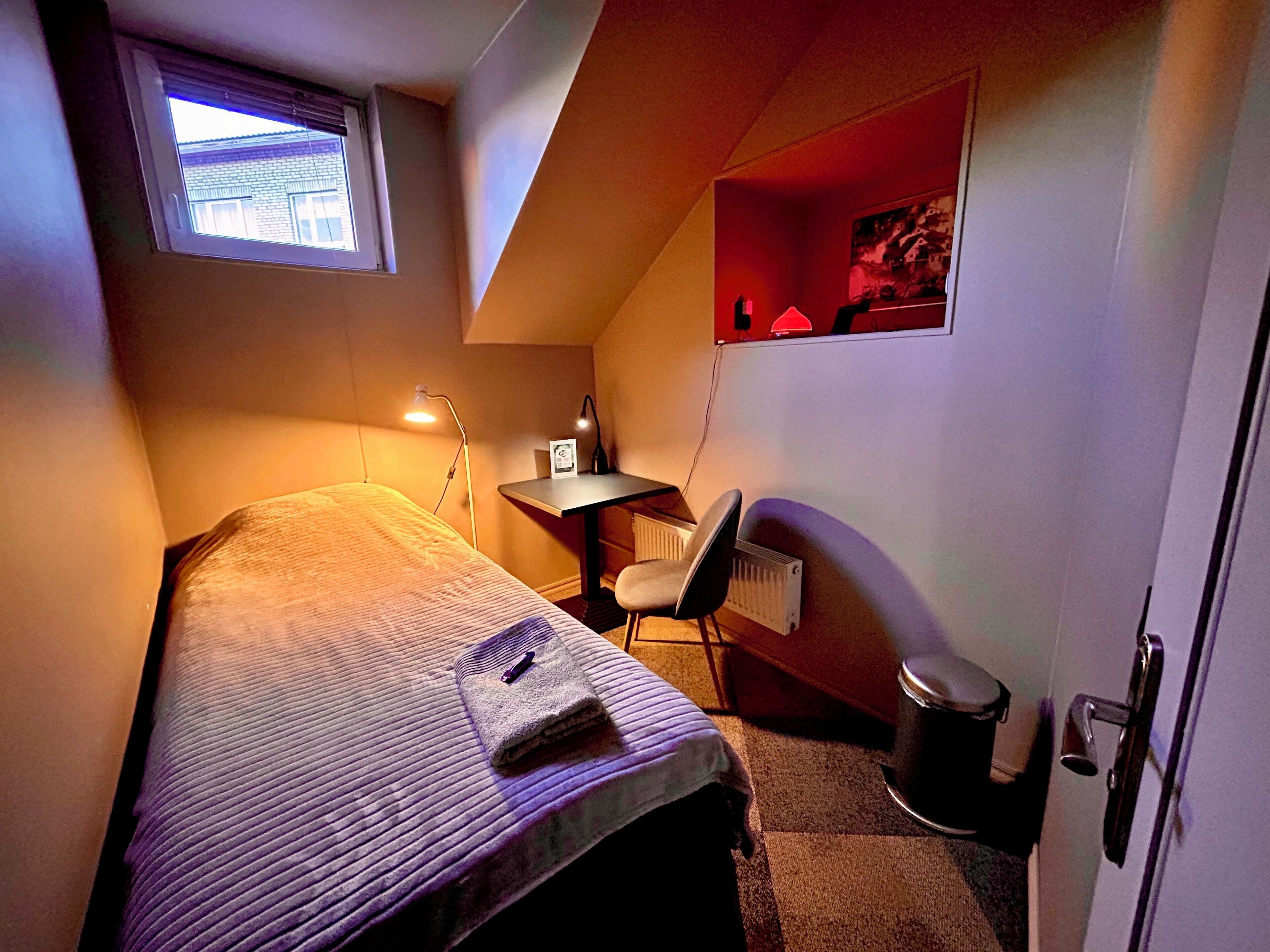 Desk, laptop workspace, blackout curtains, iron/ironing board