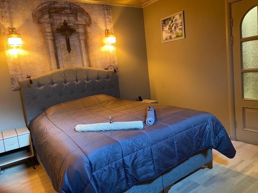 Desk, laptop workspace, blackout curtains, iron/ironing board