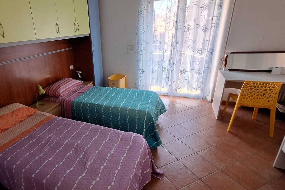 Triple Room, Balcony, City View | Desk, free WiFi