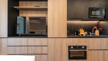 Estúdio urbano | Cozinha privada | Geladeira, micro-ondas, cooktop, cafeteira/chaleira