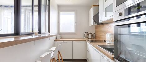 Réfrigérateur, micro-ondes, four, lave-vaisselle