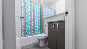 Family Apartment, 3 Bedrooms, Kitchen, City View | Bathroom | Hair dryer, towels, soap, shampoo